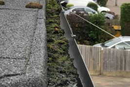 Gutters are cleared by hand or by the use of a ground based vacuum system to remove solid matter such as leaf residue and moss build up.